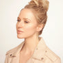 Jewel modeling long dangling midnight sun earring in gold vermeil from her Songlines Handmade Collection