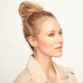 Jewel modeling faceted rainbow moonstone earrings from her Songlines Handmade Collection.