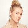 Jewel modeling Dangling gold vermeil earrings with long faceted chalcedony drops