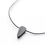 Trillion shaped rare black jade on leather cord