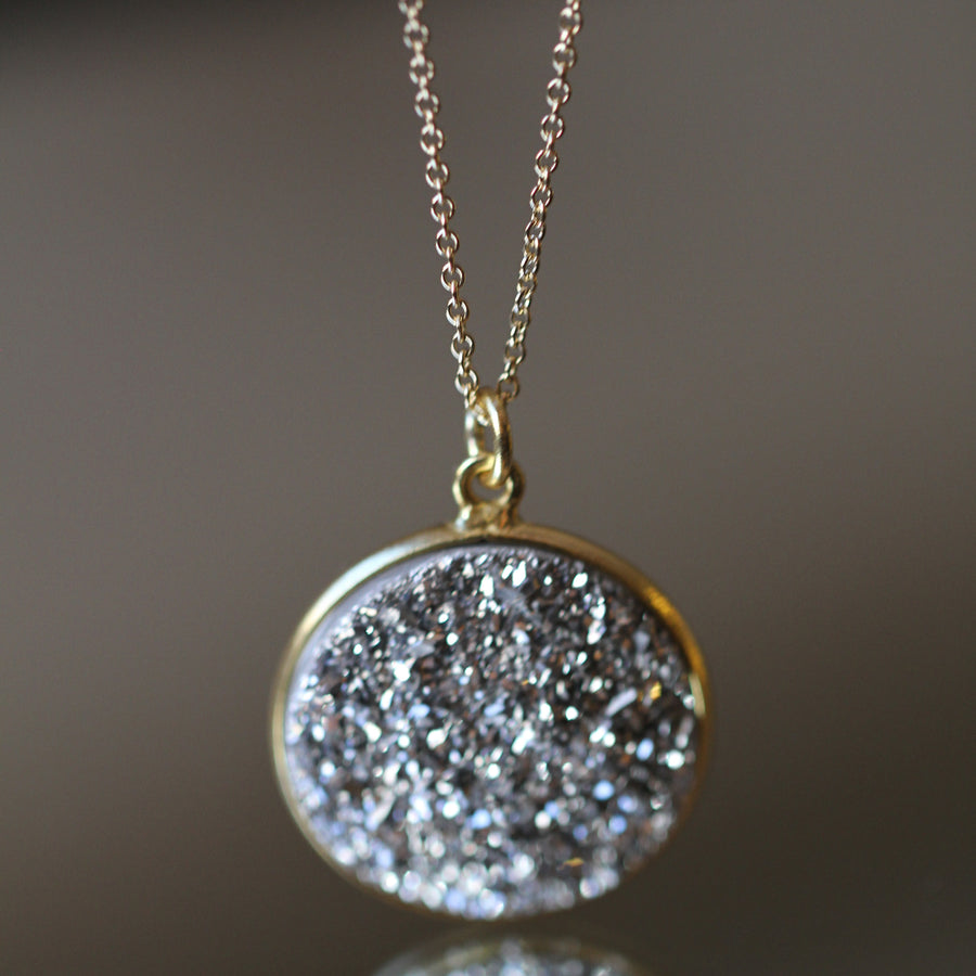 round black druzy pendant on gold filled chain from Songlines by Jewel Handmade Collection