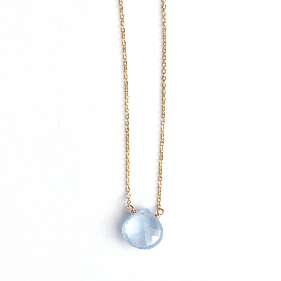 Pale blue faceted chalcedony drop pendant on gold fill chain. 